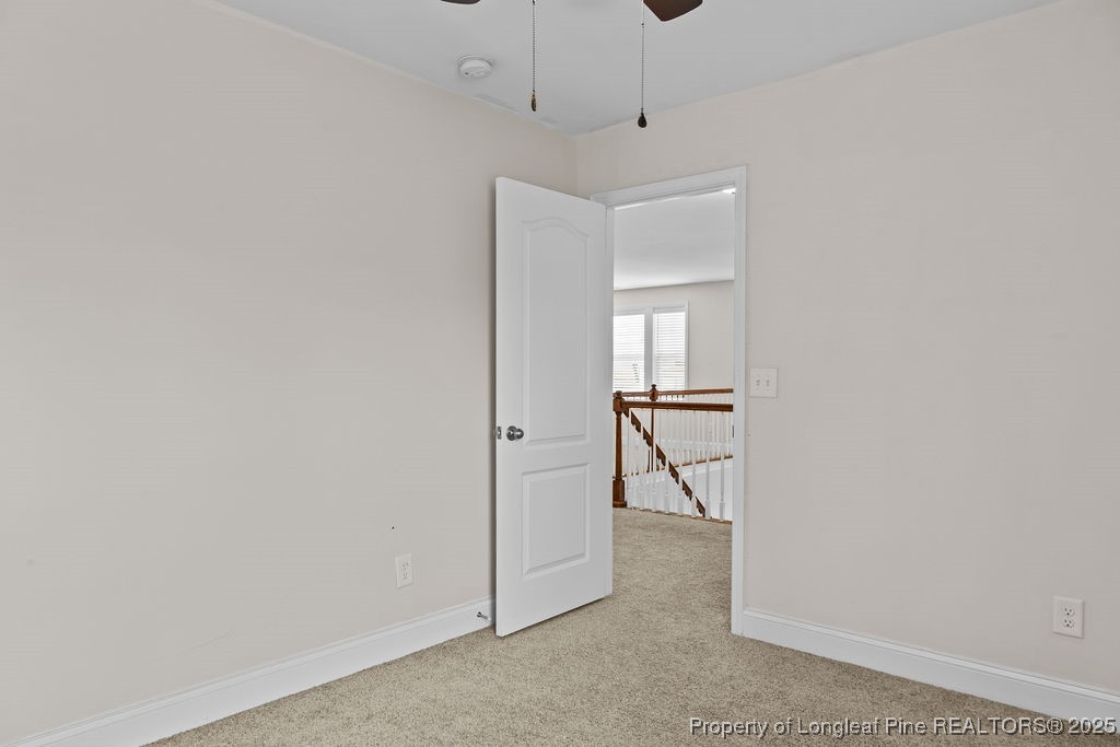 252 School Side Drive Spring Lake, NC 28390 - Photo 19 of 35 a view of a room with an empty space and a window