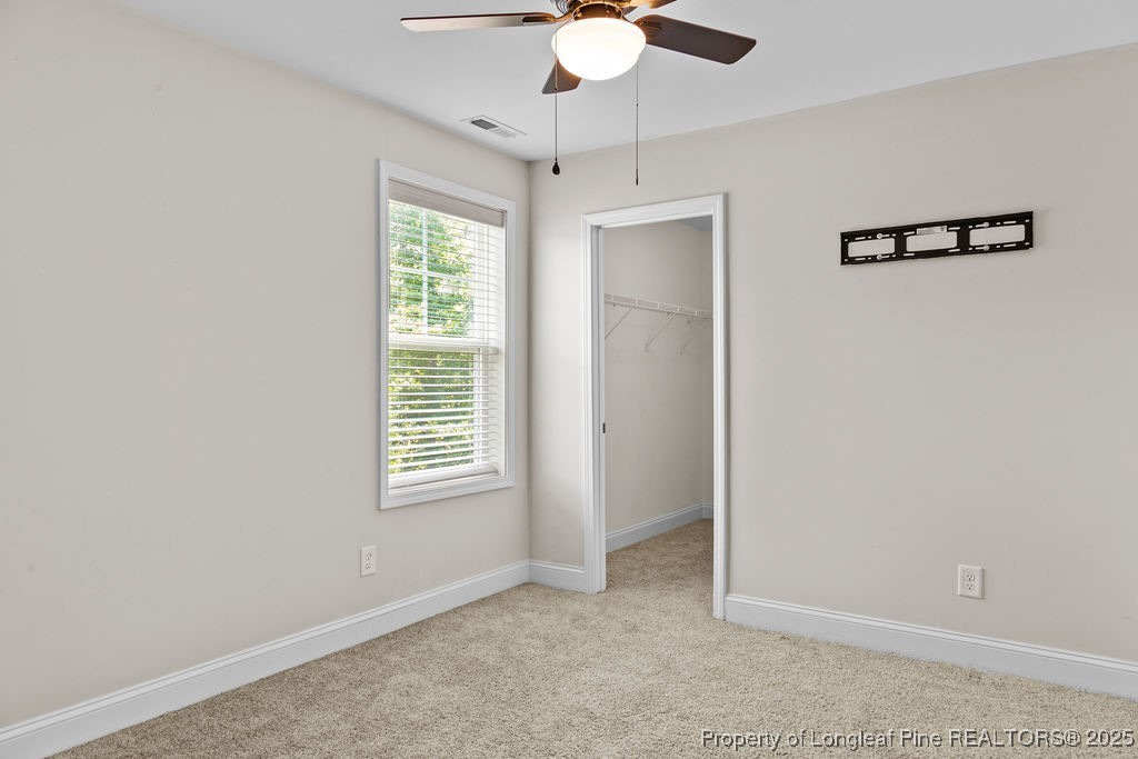 252 School Side Drive Spring Lake, NC 28390 - Photo 20 of 35 a view of an empty room with a window