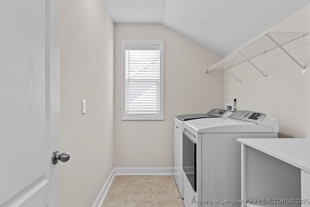 252 School Side Drive Spring Lake, NC 28390 - Photo 22 of 35 a utility room with dryer and washer