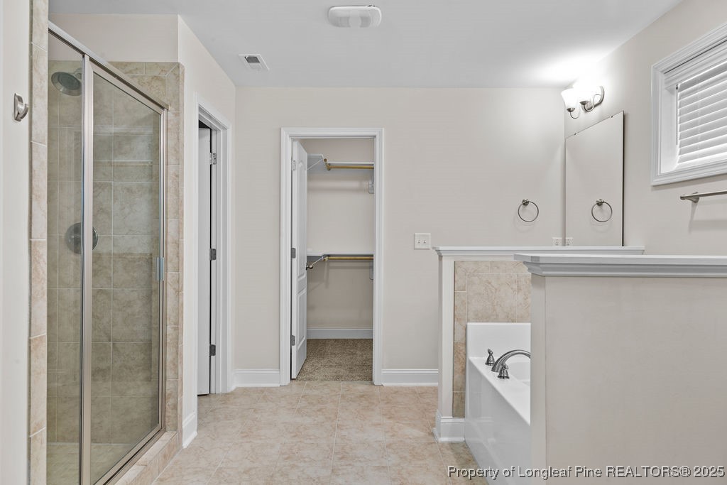 252 School Side Drive Spring Lake, NC 28390 - Photo 25 of 35 a view of a bathroom with mirror