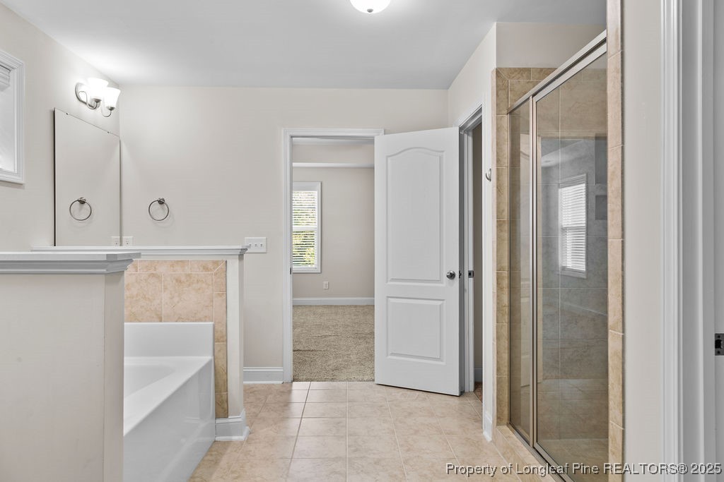 252 School Side Drive Spring Lake, NC 28390 - Photo 27 of 35 a bathroom with a shower and a sink