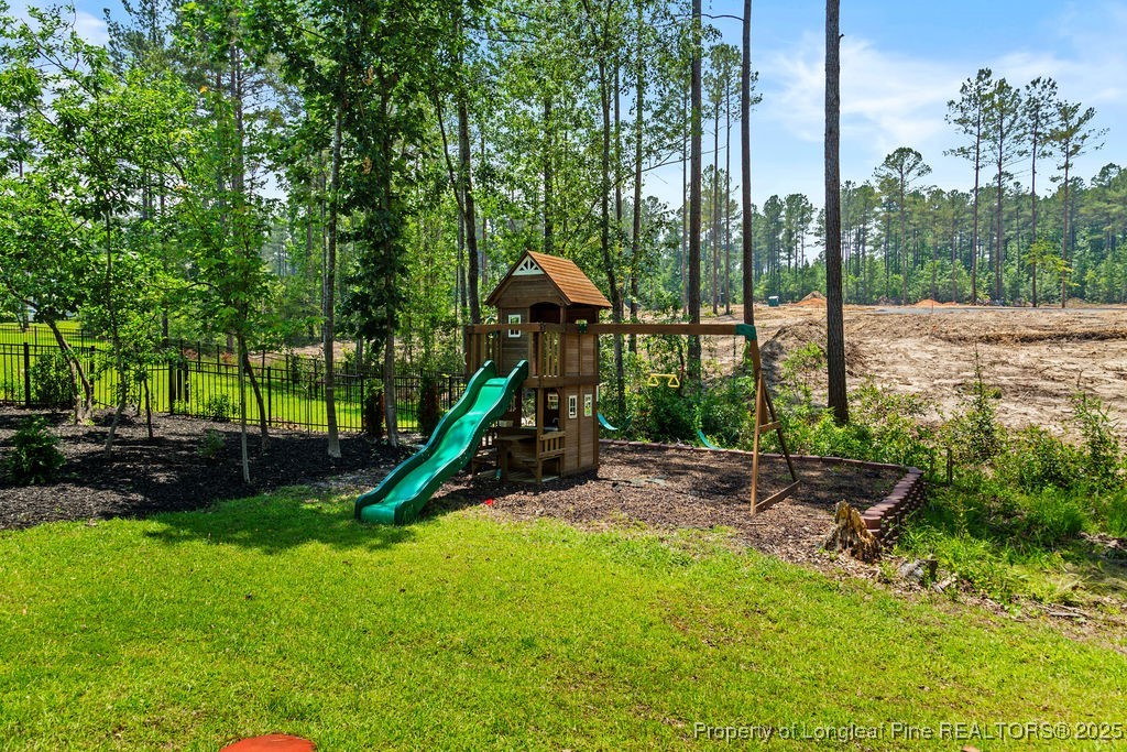 252 School Side Drive Spring Lake, NC 28390 - Photo 31 of 35 a view of a park with a slide