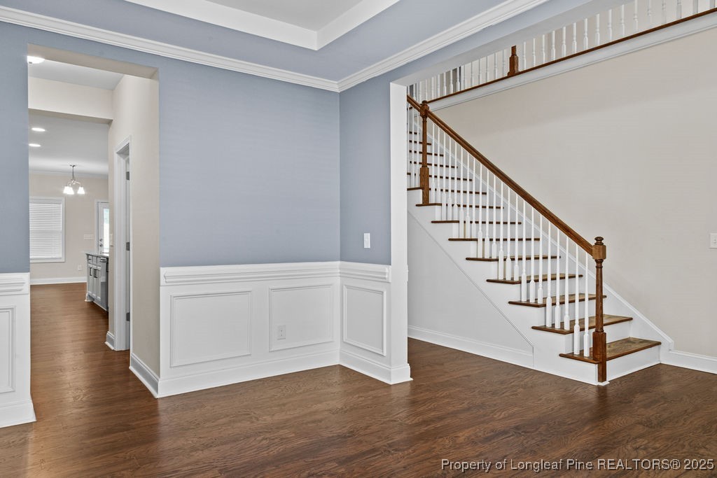 252 School Side Drive Spring Lake, NC 28390 - Photo 4 of 35 a view of an entryway with wooden floor and stairs