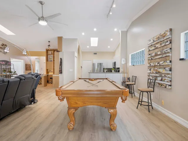 a room with furniture and a flat screen tv
