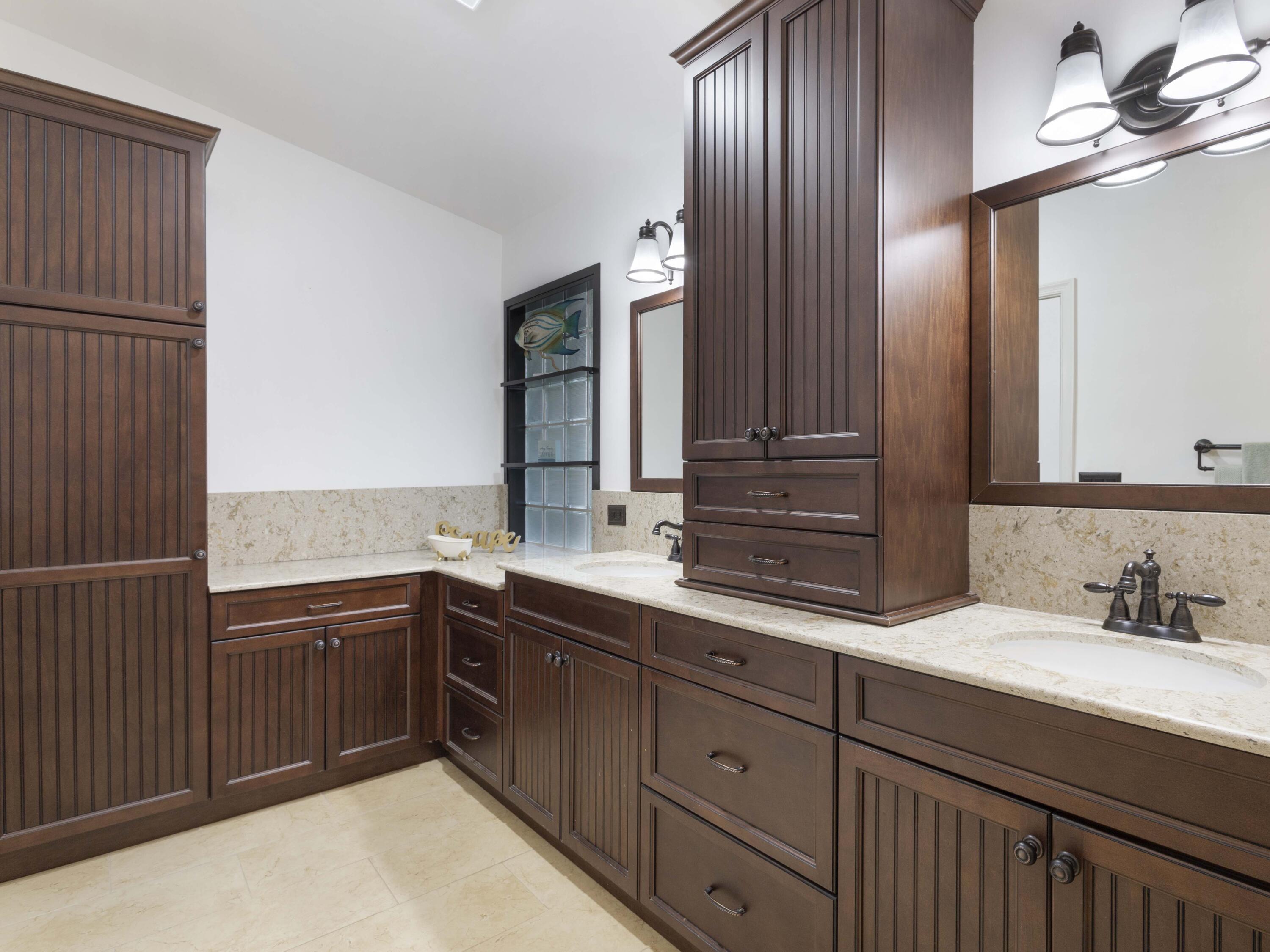 9734 Harbour Lake Circle Boynton Beach, FL 33437 - Photo 26 of 41 a kitchen with a sink and cabinets