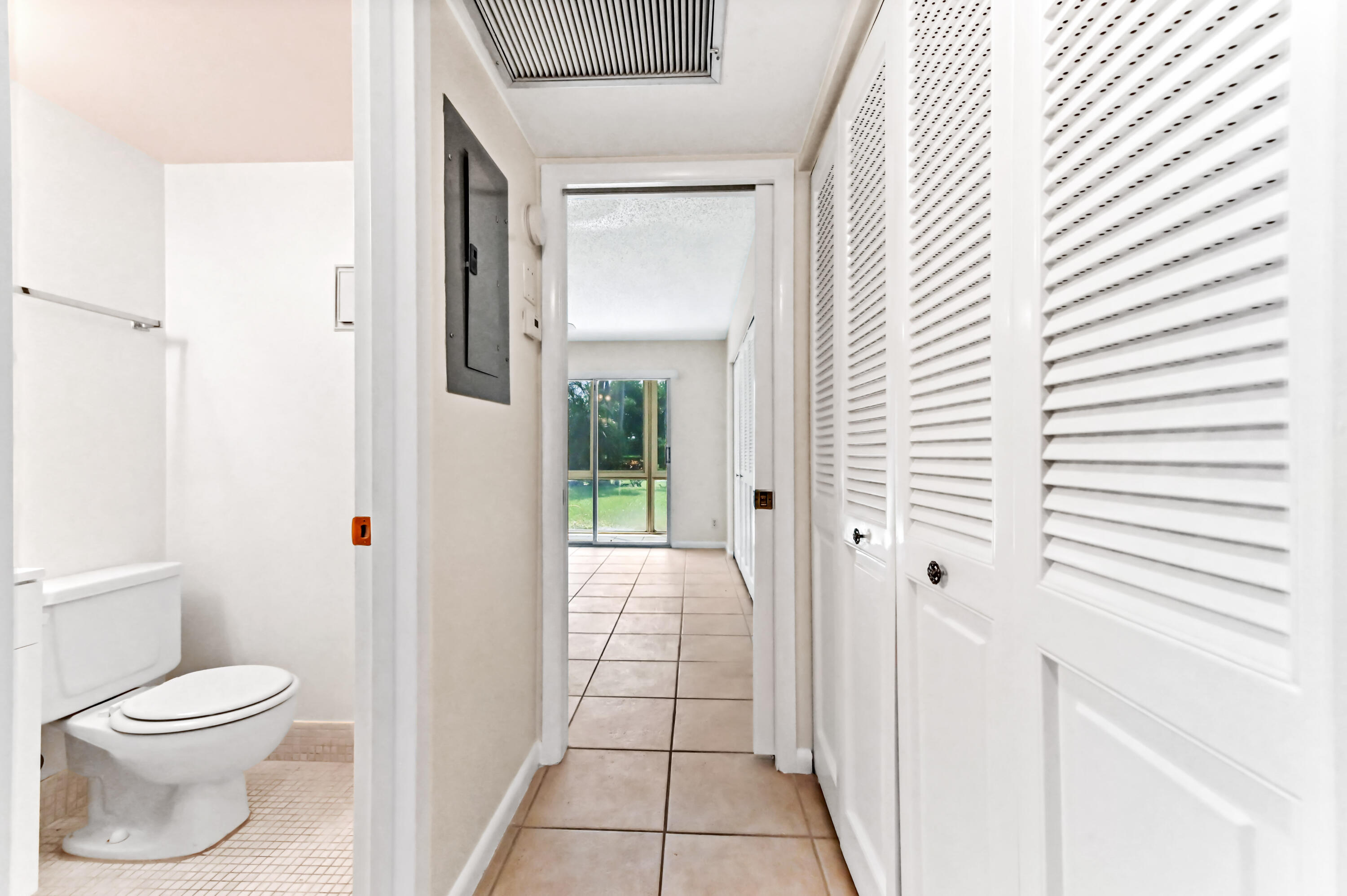 1010 Newcastle A, Unit 1010 Boca Raton, FL 33434 - Photo 12 of 27 a bathroom with a toilet