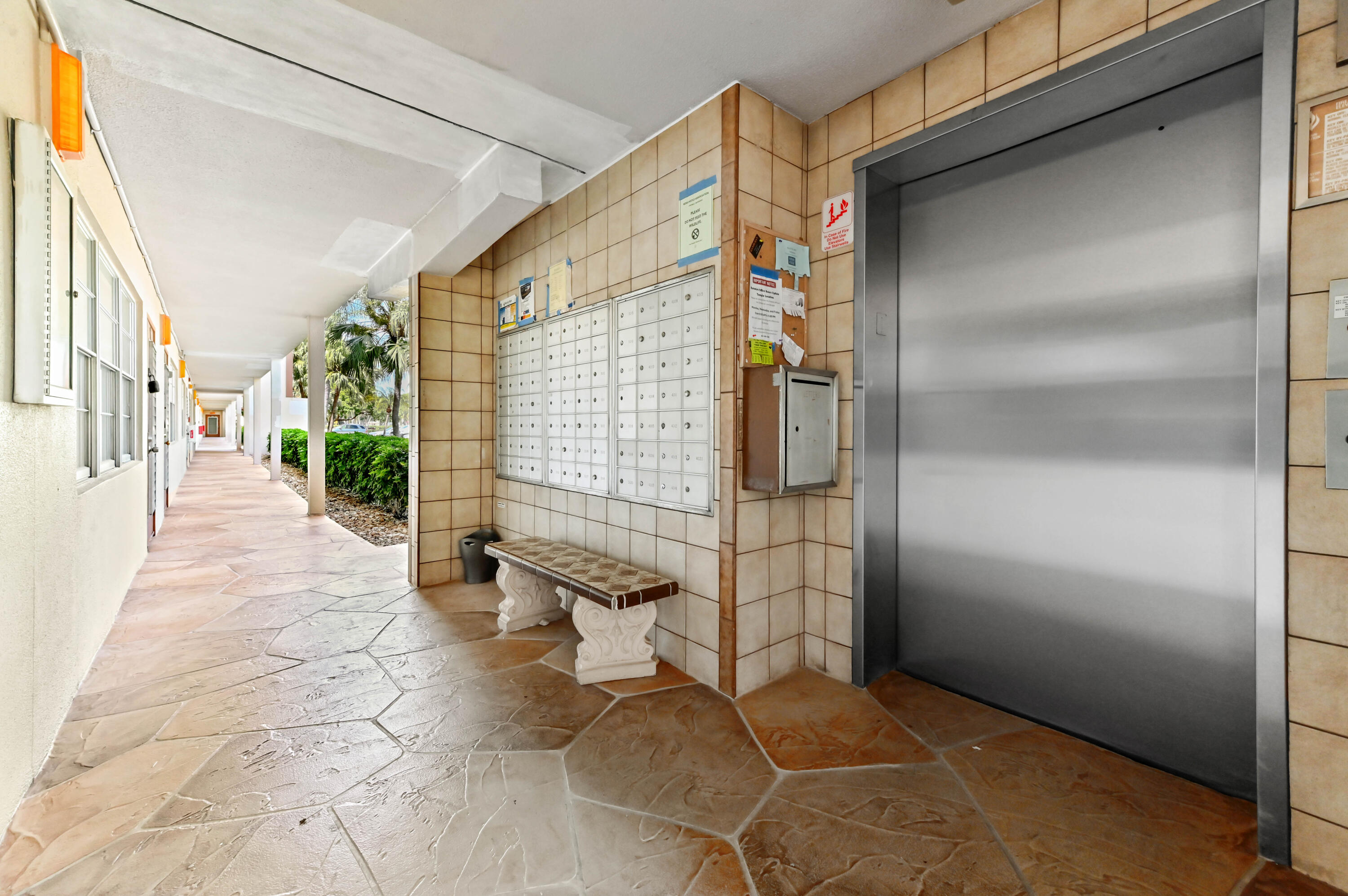 1010 Newcastle A, Unit 1010 Boca Raton, FL 33434 - Photo 26 of 27 a view of entryway with outdoor area