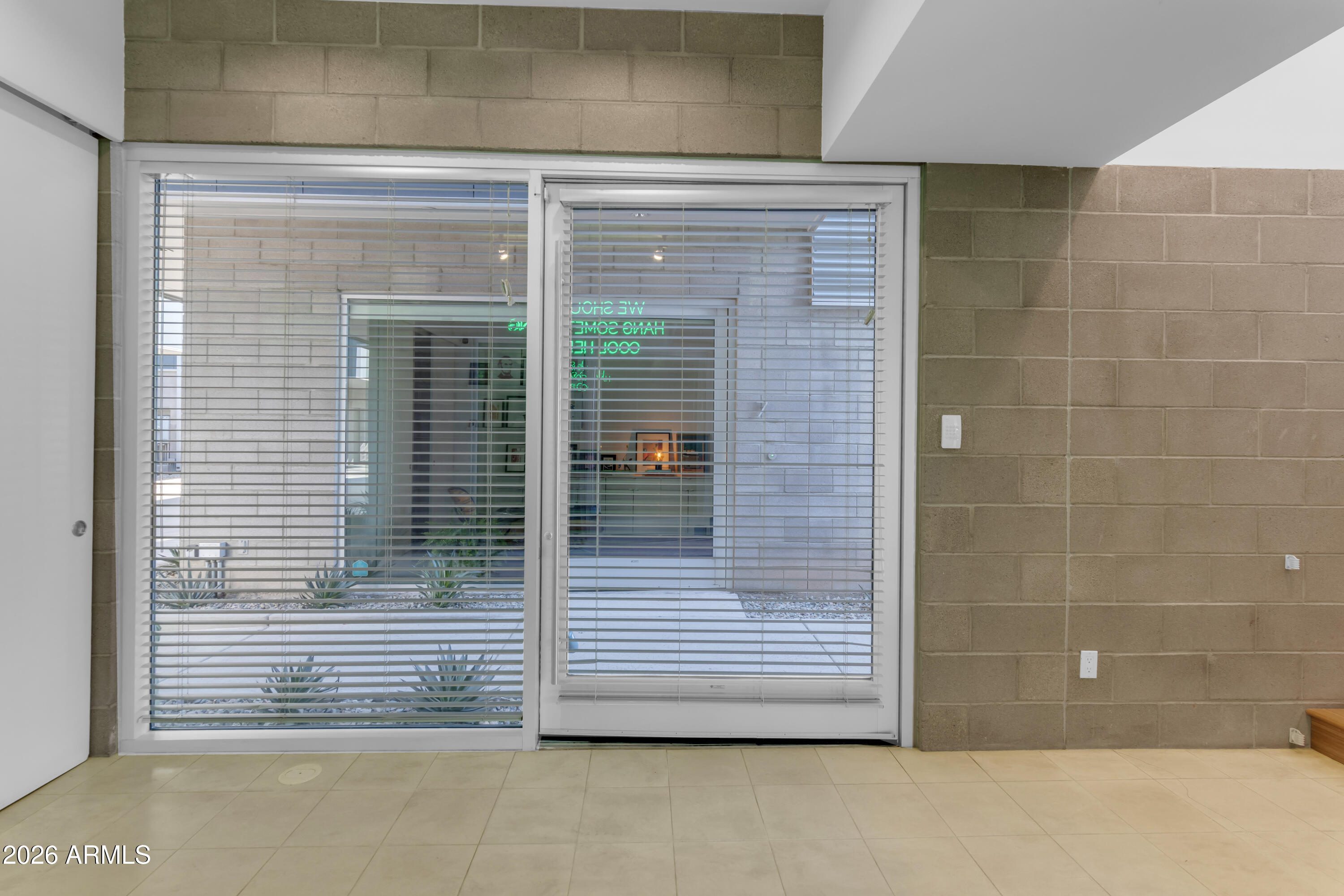 4410 North 27th Street, Unit 6 Phoenix, AZ 85016 - Photo 22 of 48 a view of a door and a window