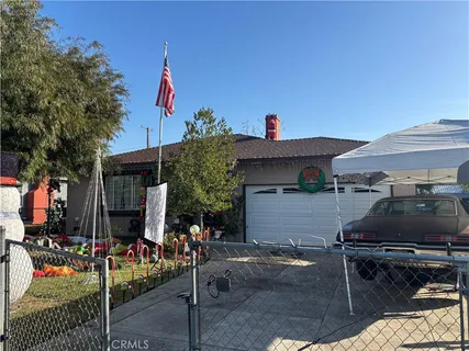 a front view of a house with garage