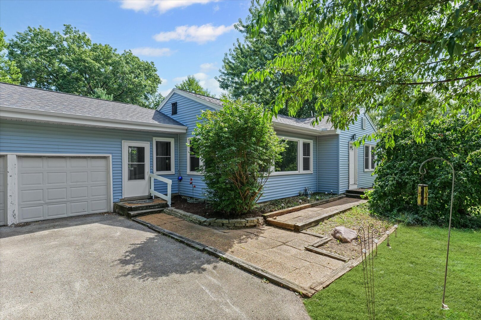 front view of a house with a yard