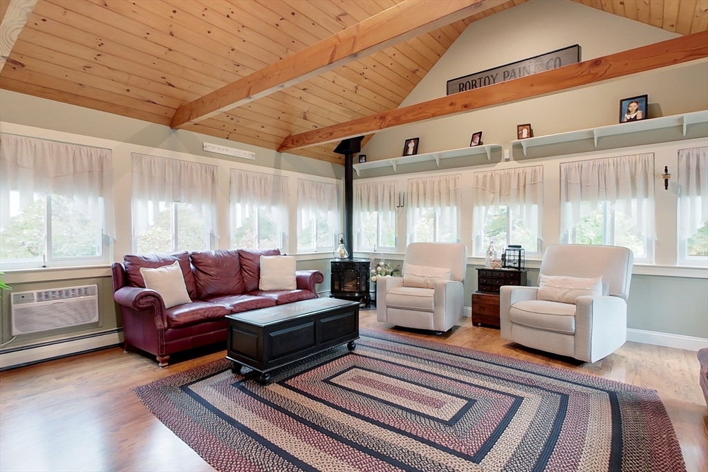 86 Turnpike Road Townsend, MA 01469 - Photo 18 of 42 a living room with furniture and a large window