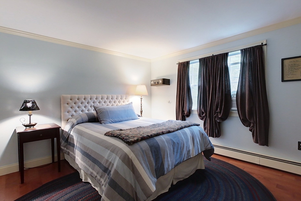 86 Turnpike Road Townsend, MA 01469 - Photo 23 of 42 a bedroom with a bed and a window