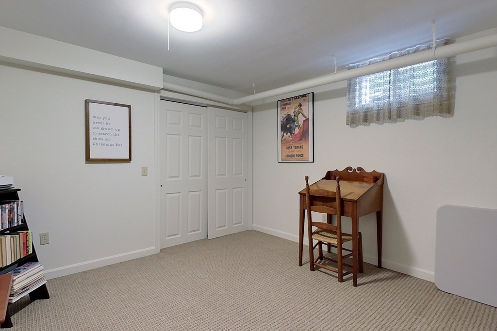 86 Turnpike Road Townsend, MA 01469 - Photo 31 of 42 a view of a workspace with furniture and a window