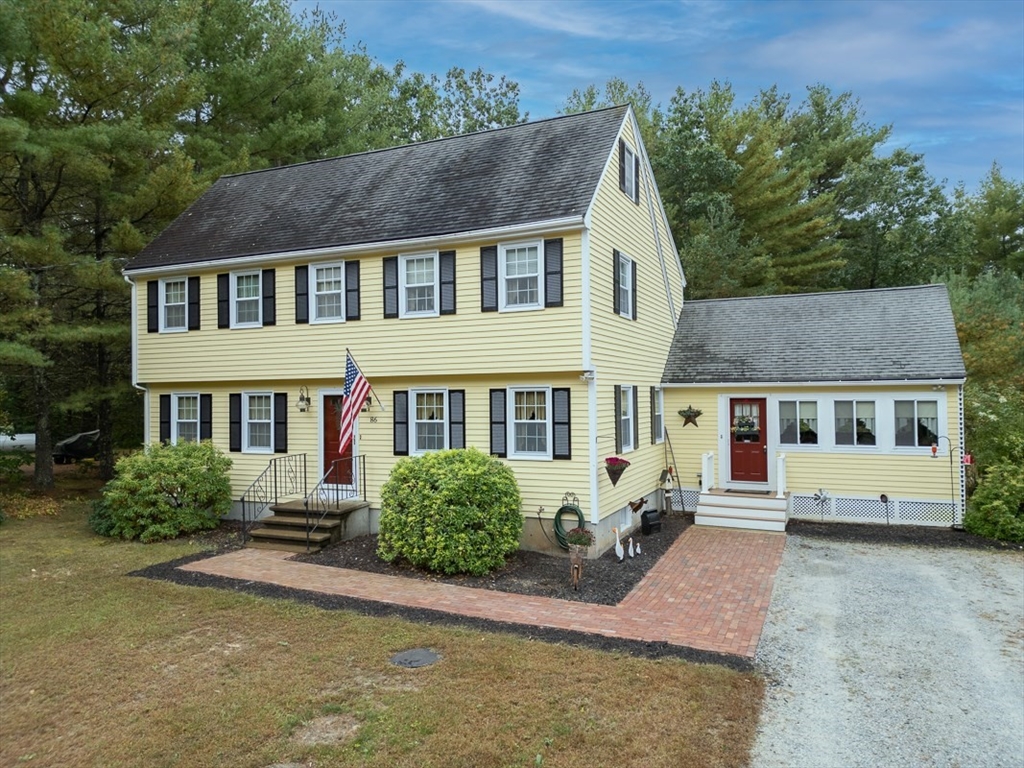 86 Turnpike Road Townsend, MA 01469 - Photo 32 of 42 front view of a house with a yard