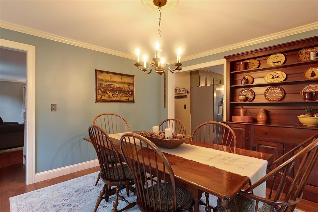 86 Turnpike Road Townsend, MA 01469 - Photo 7 of 42 a view of a dining room with furniture and chandelier