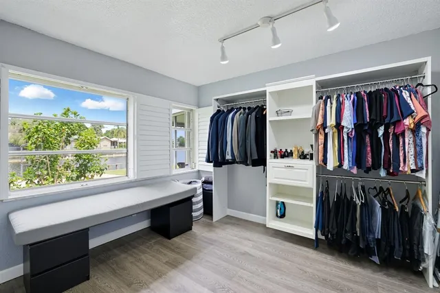 a living room with lots of furniture and a window