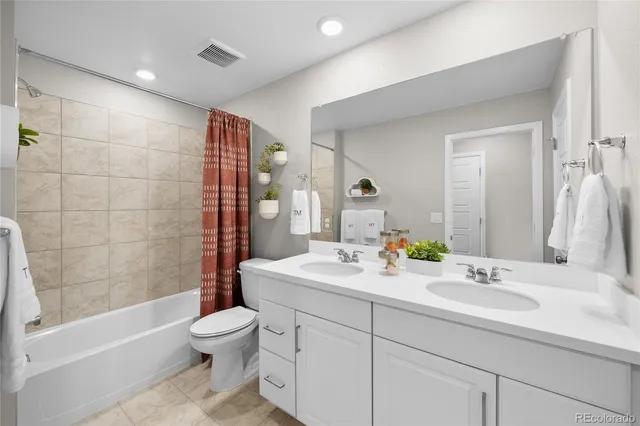 a kitchen with a sink a stove and cabinets