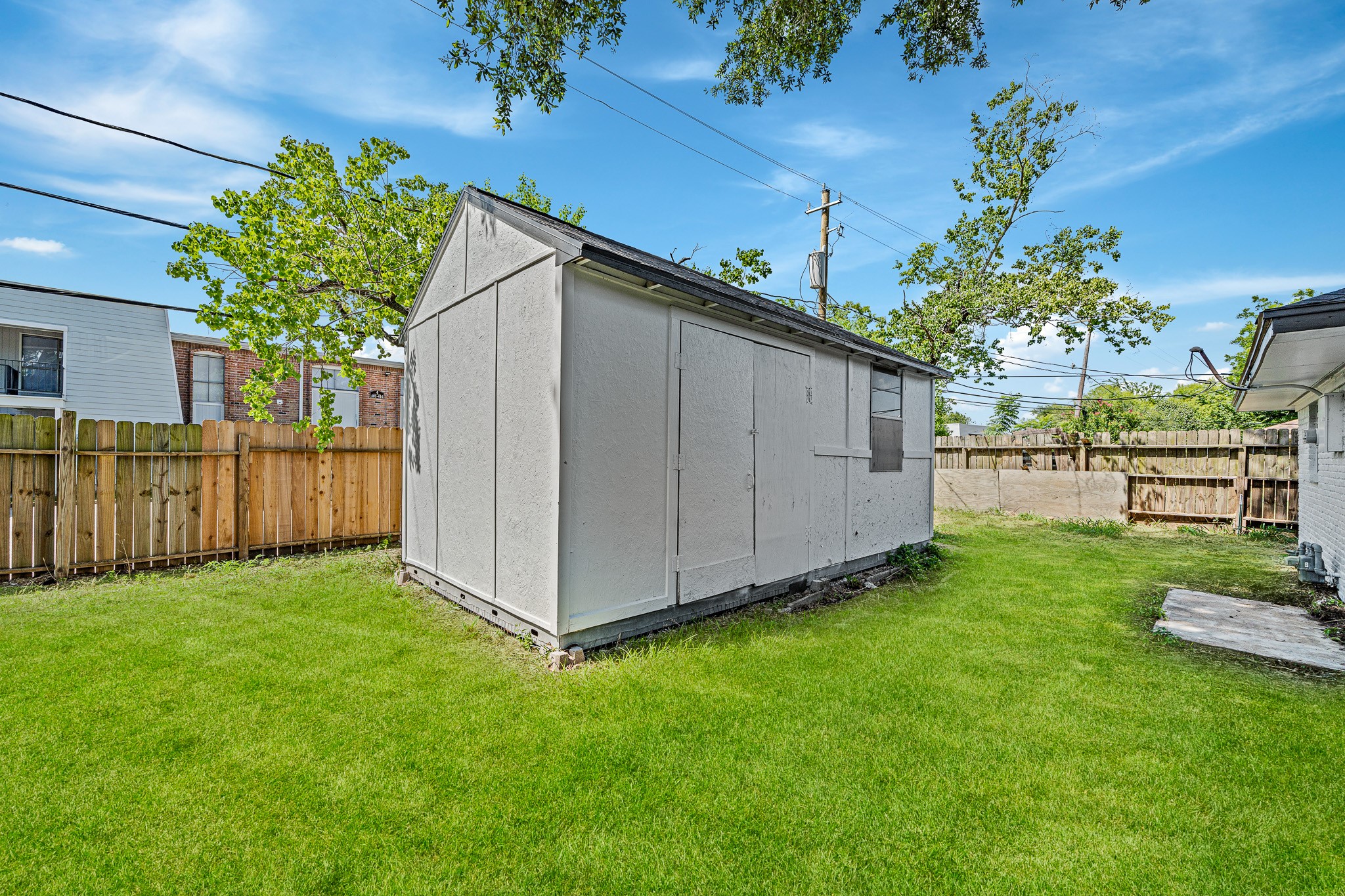 111 Princess Drive Houston, TX 77034 - Photo 29 of 30 a view of a backyard with a garden