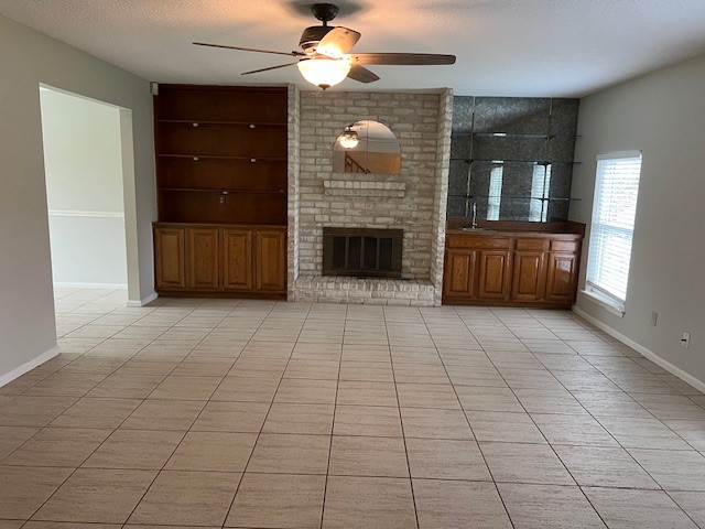 7407 Navidad Road Houston, TX 77083 - Photo 8 of 29 a view of a livingroom with a fireplace