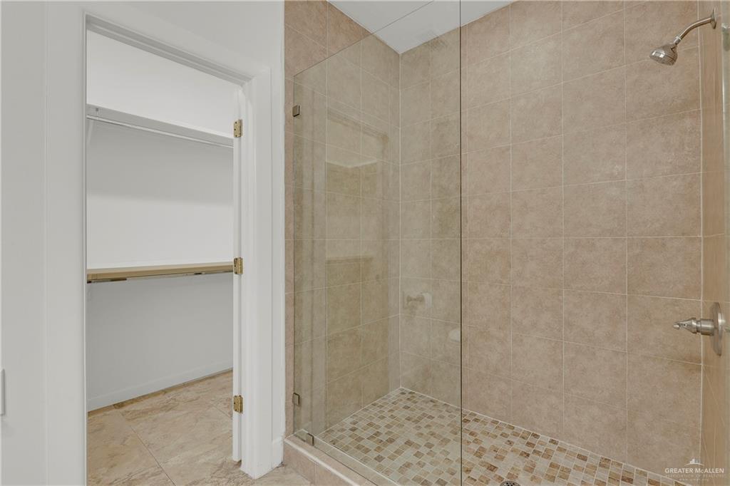 209 Robin Avenue McAllen, TX 78504 - Photo 13 of 20 a bathroom with a shower
