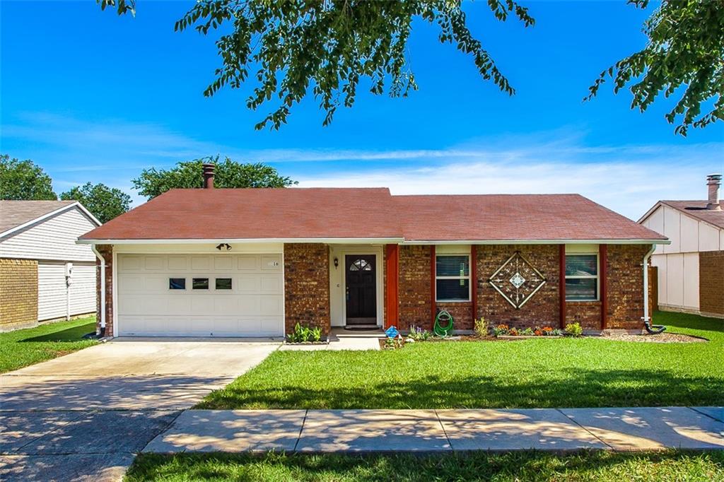 5516 Rearn Drive The Colony, TX 75056 - Photo 1 of 1 front view of a house with a garden