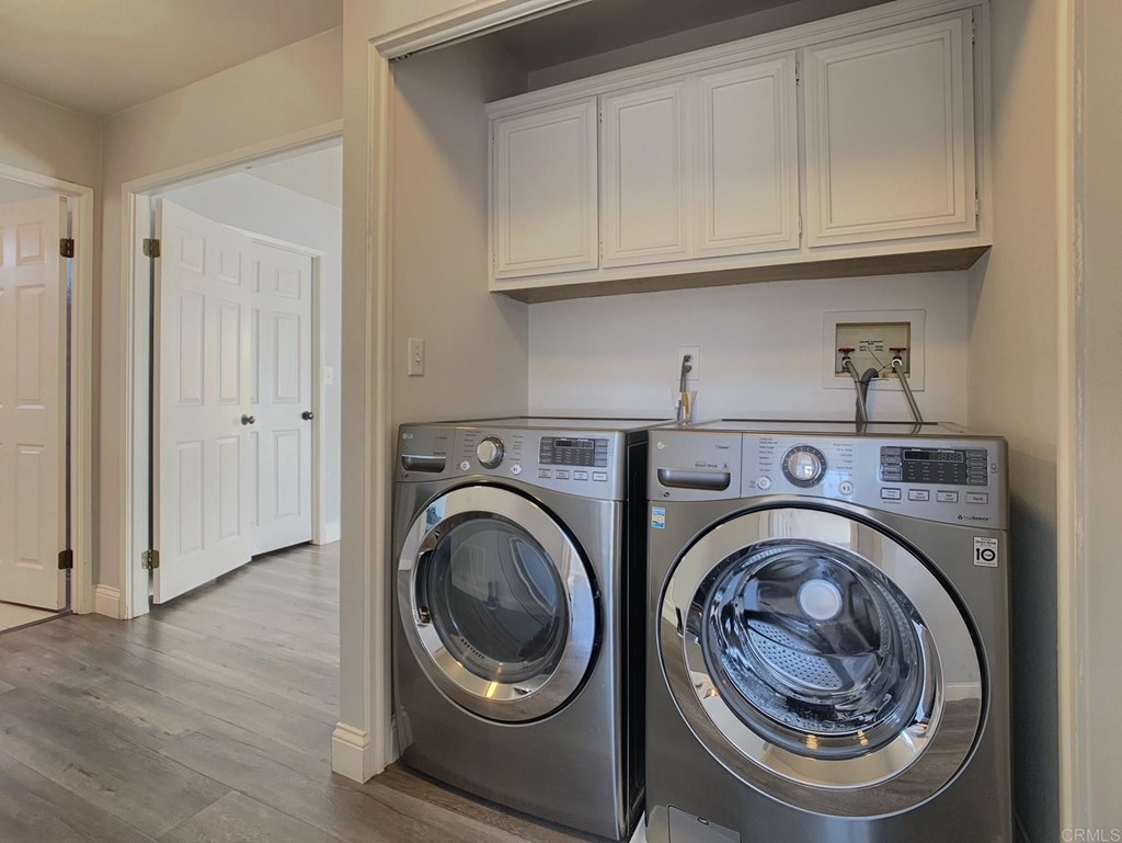 15935 Spring Oaks Road, Unit 63 El Cajon, CA 92021 - Photo 12 of 38 a utility room with dryer and washer