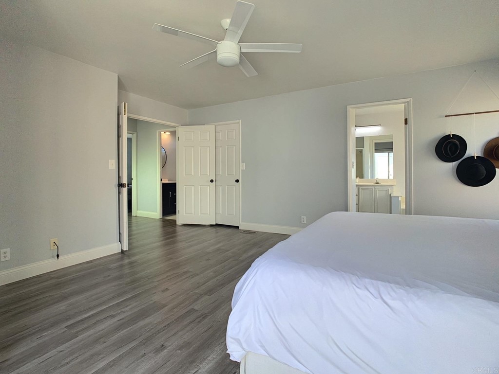 15935 Spring Oaks Road, Unit 63 El Cajon, CA 92021 - Photo 17 of 38 a bedroom with a bed and a window