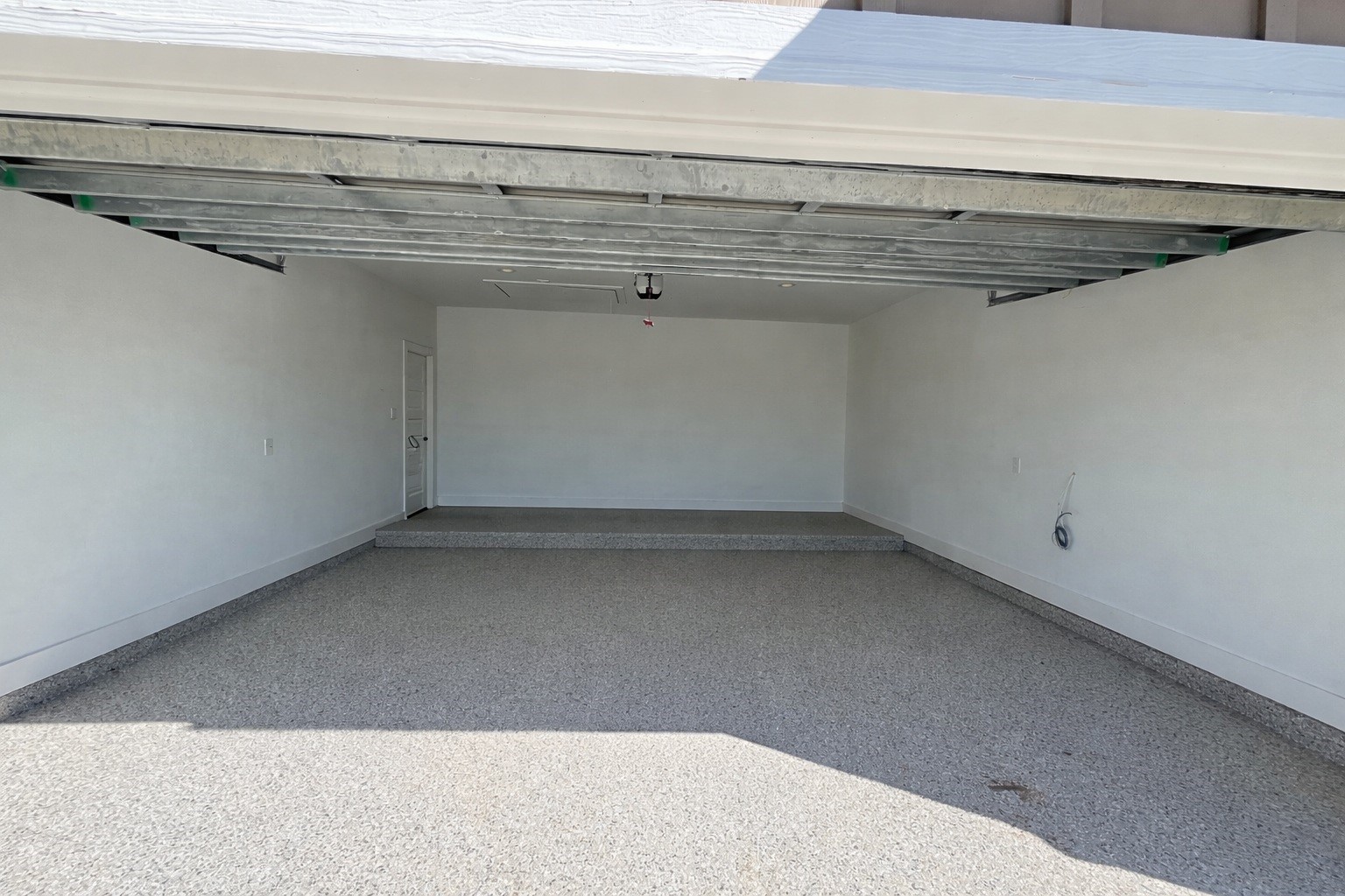 471 Buffalo Trail Angleton, TX 77515 - Photo 29 of 35 Garage with epoxy flooring