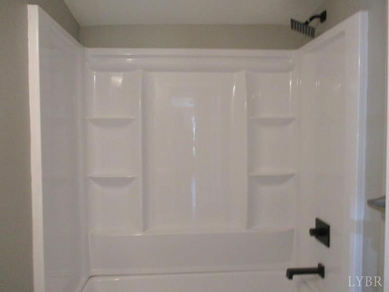 5629 Gladys Road Altavista, VA 24517 - Photo 15 of 29 a bathroom with a shower