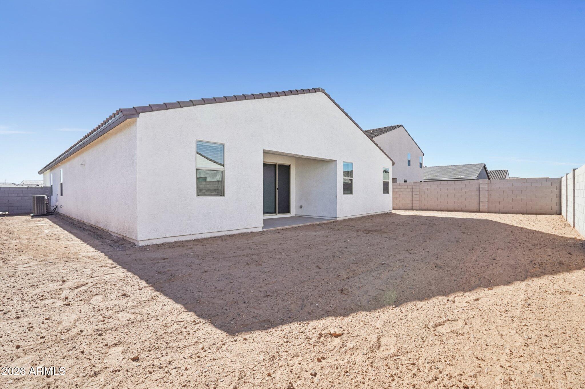47162 West Cansados Road Maricopa, AZ 85139 - Photo 38 of 50 a view of a house with a backyard