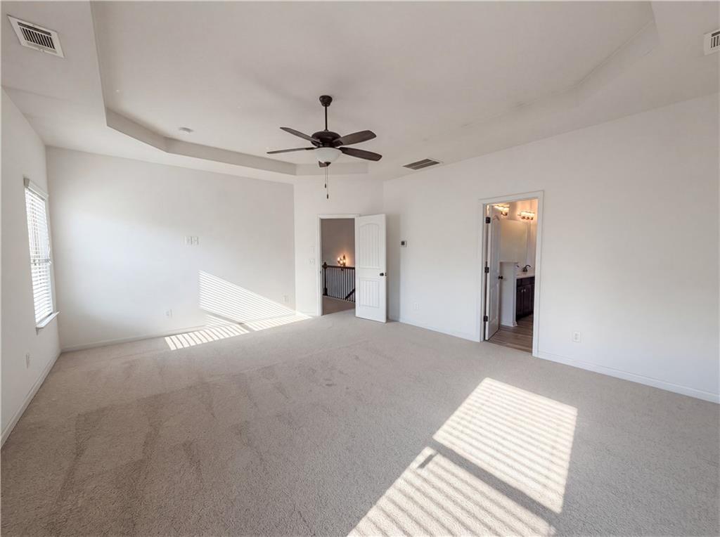 307 Valley View Trail Dallas, GA 30132 - Photo 15 of 41 a view of a big room with wooden floor and a ceiling fan