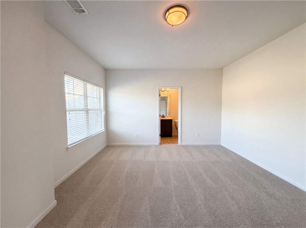 307 Valley View Trail Dallas, GA 30132 - Photo 18 of 41 an empty room with windows