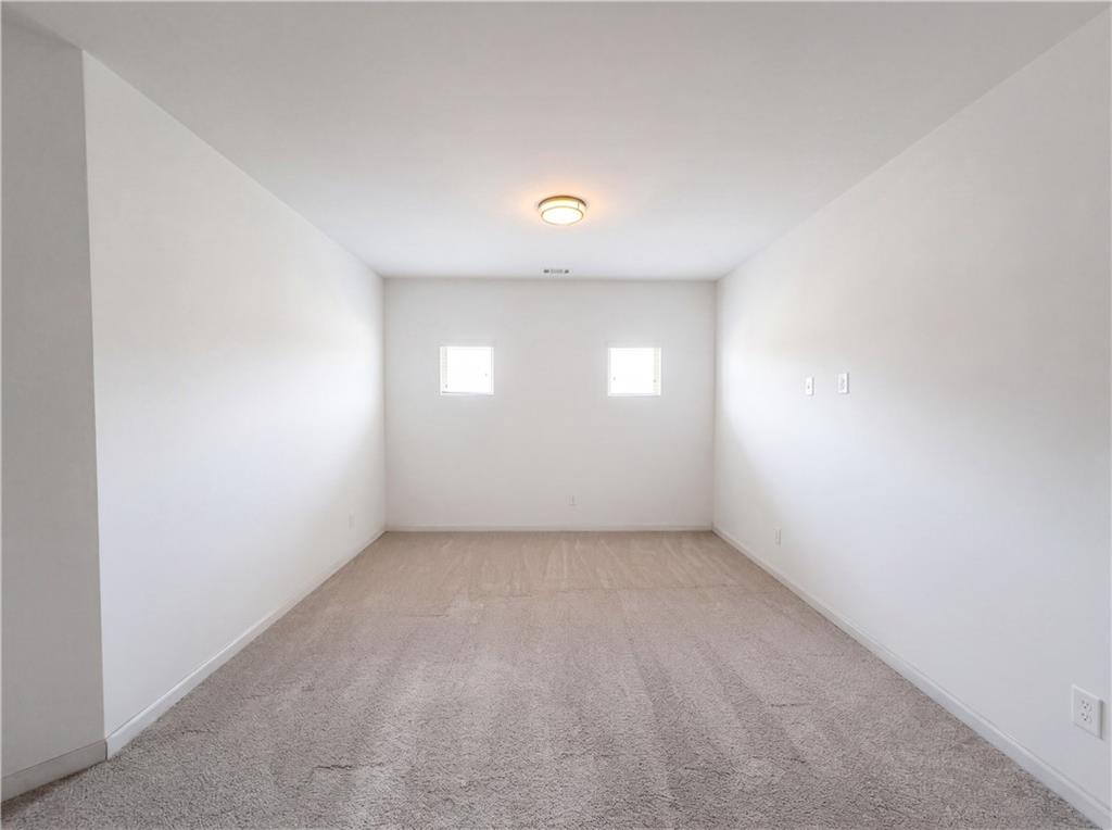 307 Valley View Trail Dallas, GA 30132 - Photo 21 of 41 an empty room with windows