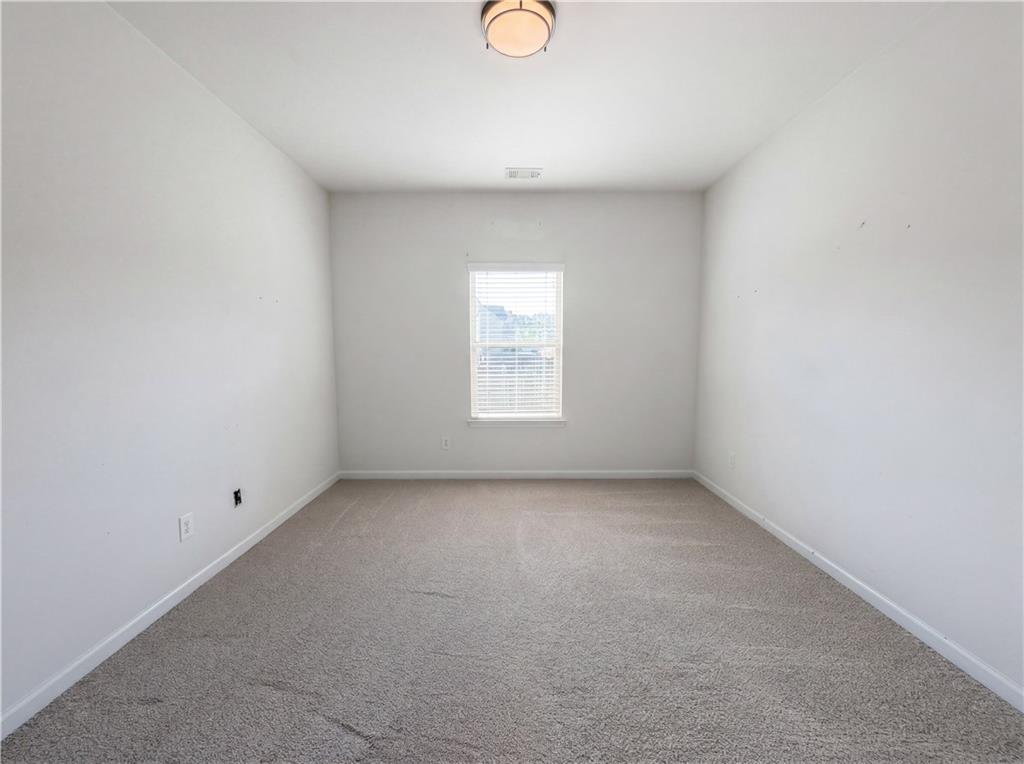 307 Valley View Trail Dallas, GA 30132 - Photo 22 of 41 a view of a room that has a window in it