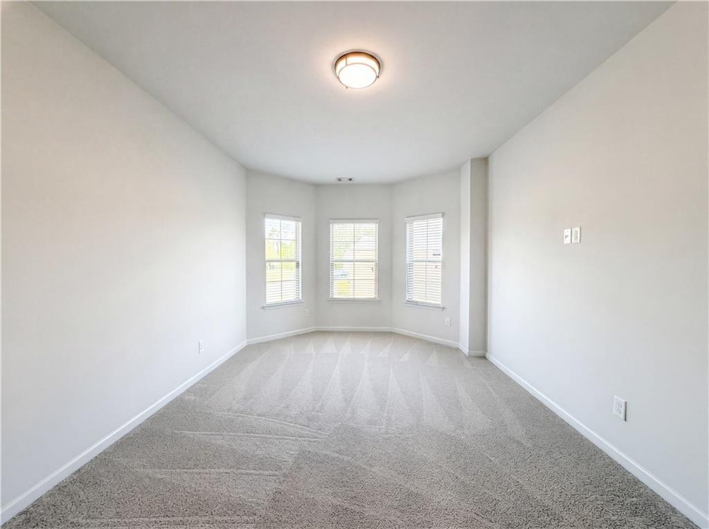 307 Valley View Trail Dallas, GA 30132 - Photo 23 of 41 a view of an empty room with a window