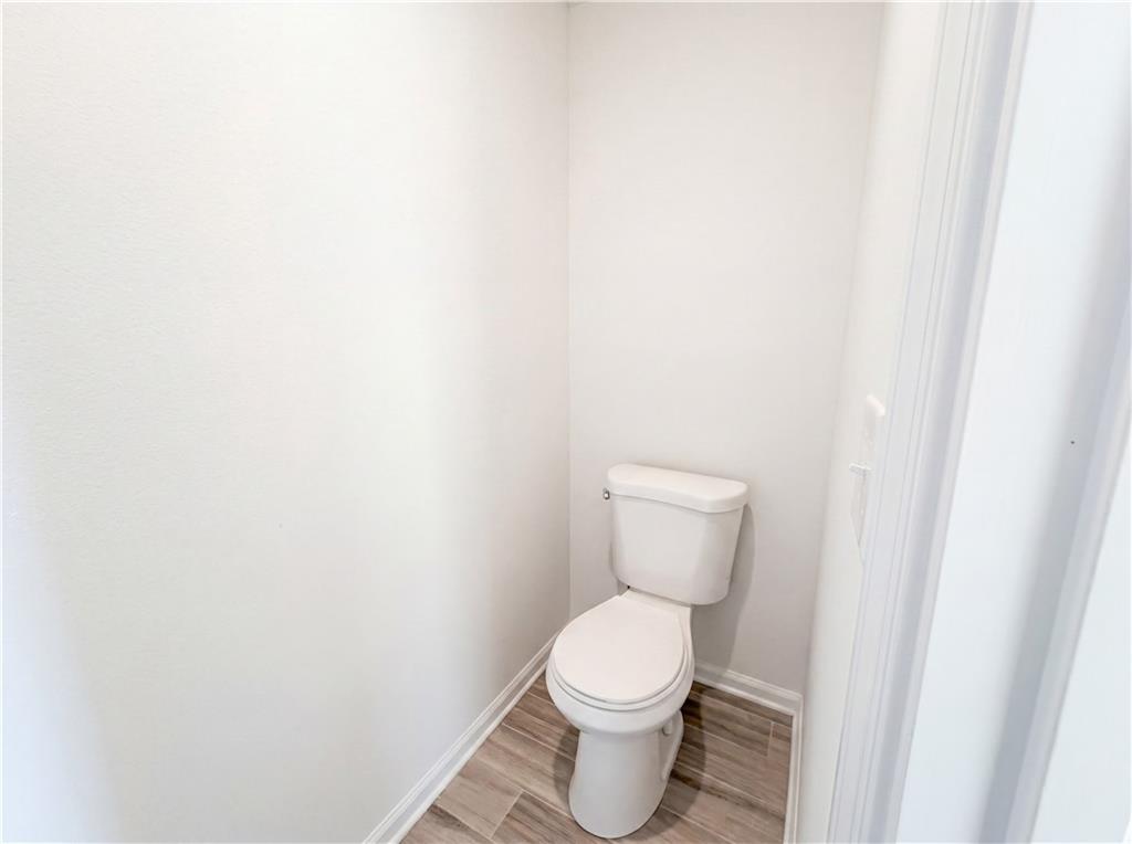 307 Valley View Trail Dallas, GA 30132 - Photo 28 of 41 a white toilet sitting next to a white wall