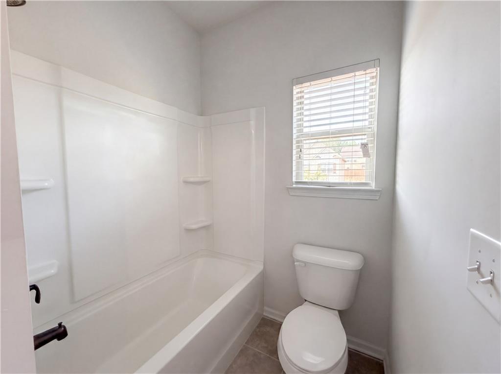 307 Valley View Trail Dallas, GA 30132 - Photo 35 of 41 a bathroom with a toilet a sink and a bathtub