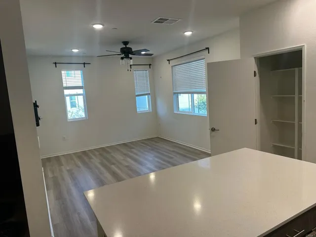 a view of an empty room and window