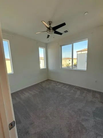 a view of a kitchen with washer and dryer