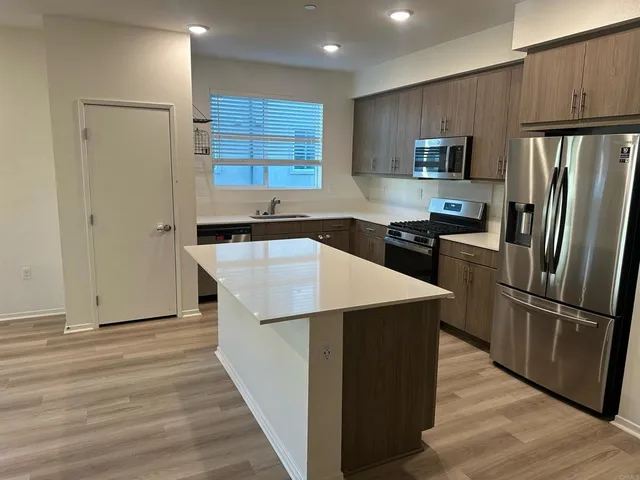 a bathroom with a double vanity sink and mirror