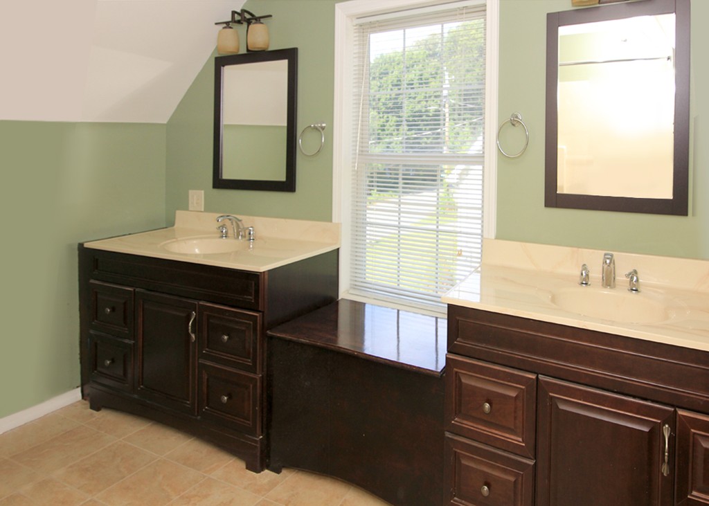 15 Cross Street Chicopee, MA 01013 - Photo 12 of 15 a bathroom with a sink and a mirror