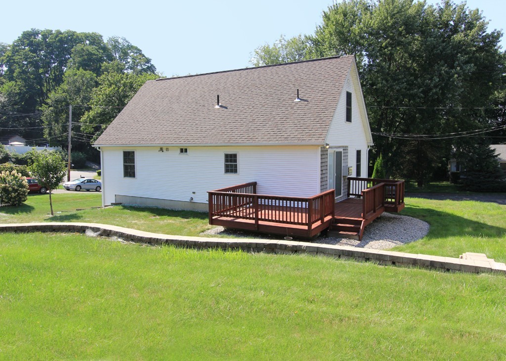 15 Cross Street Chicopee, MA 01013 - Photo 4 of 15 a view of a house with a yard patio and swimming pool