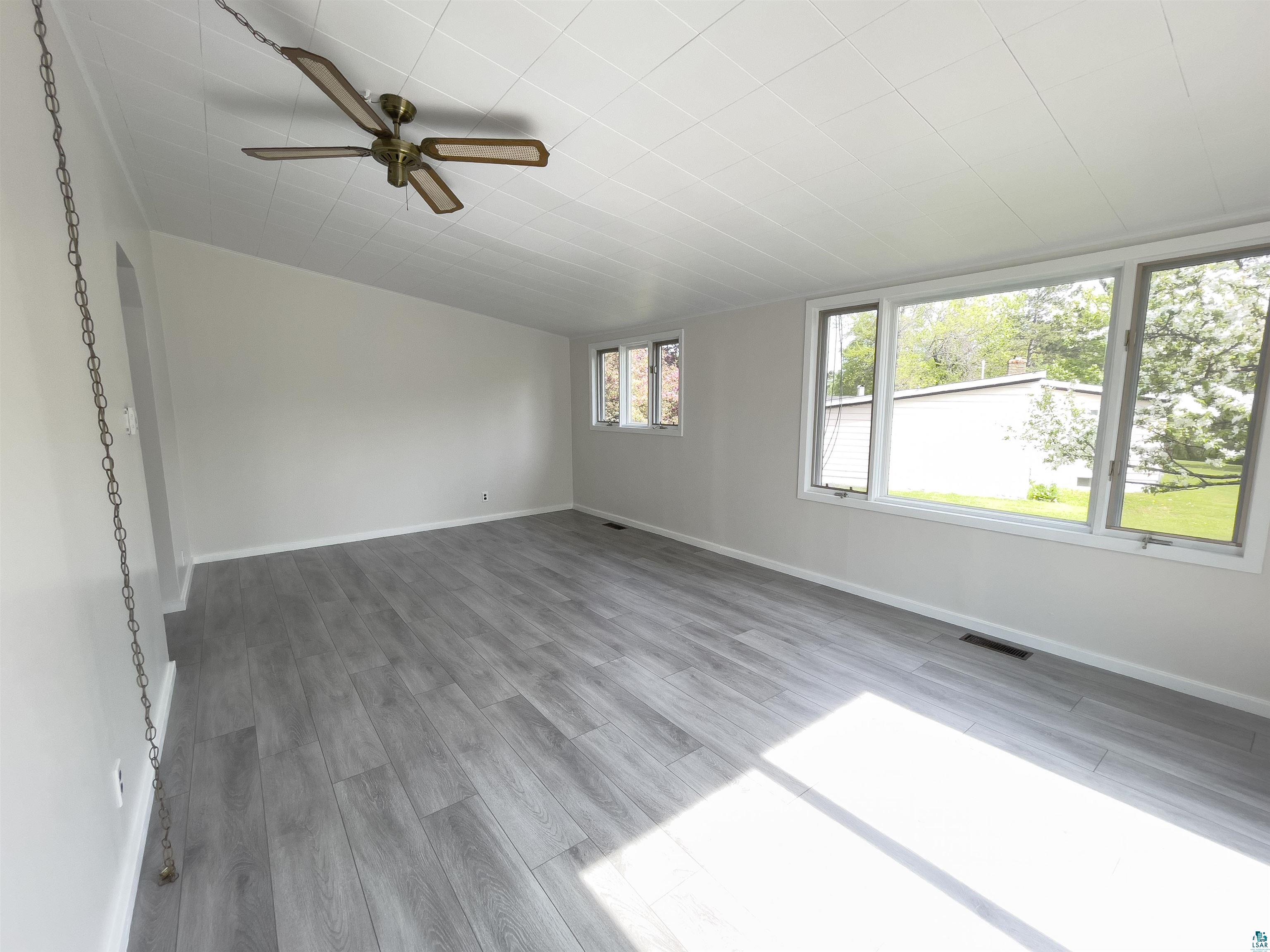 41 Bell Creek Silver Bay, MN 55614 - Photo 9 of 38 Large windows allow natural light