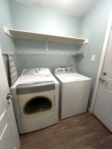 a utility room with dryer and washer