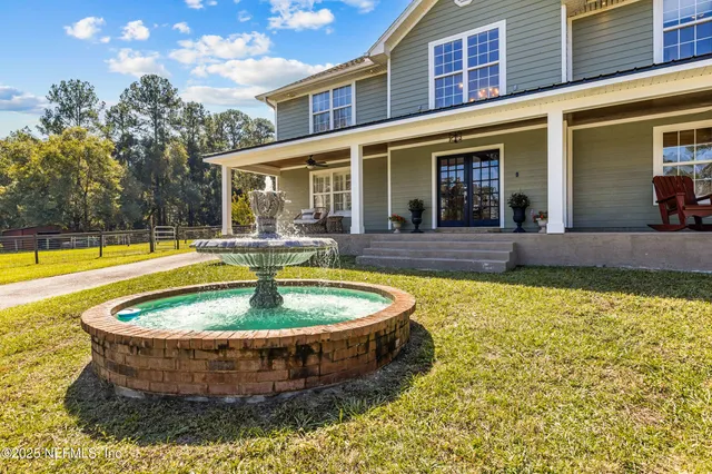 a view of a house with swimming pool