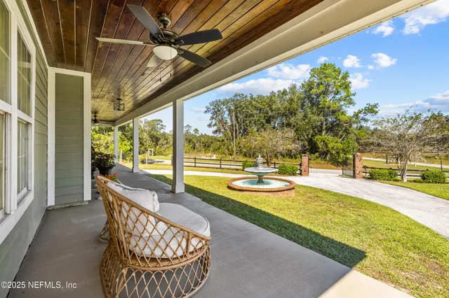 a view of entryway with wooden floor and stairs
