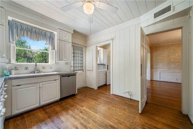 a bathroom with a sink and a large mirror
