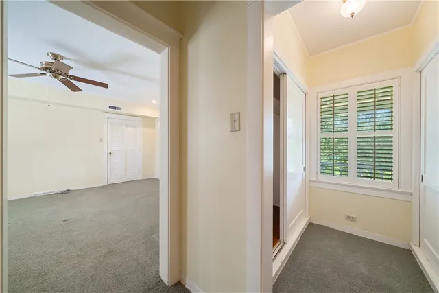 an empty room that has a window