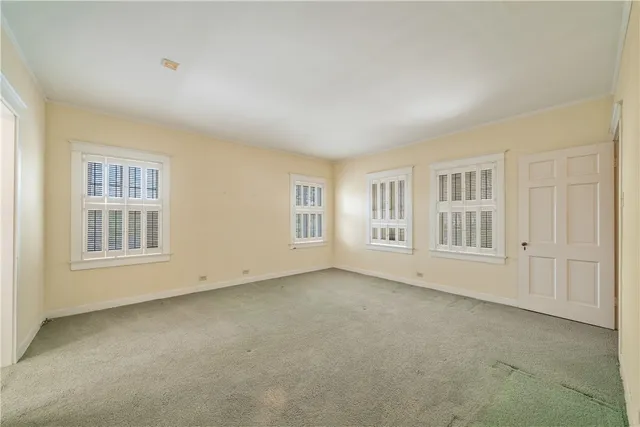 an empty room with windows