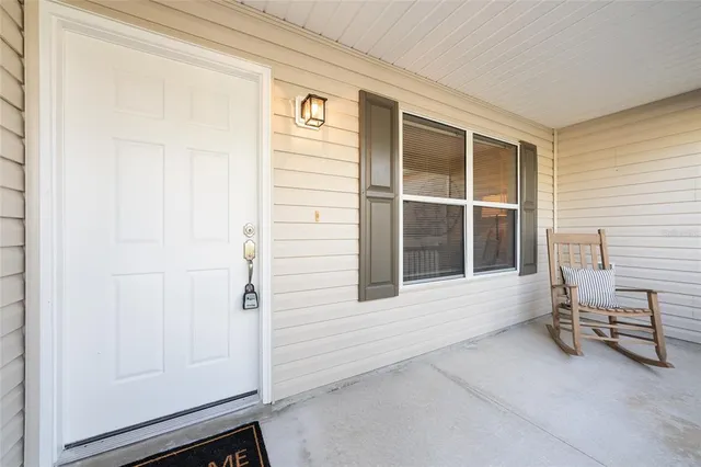 a view of house with backyard